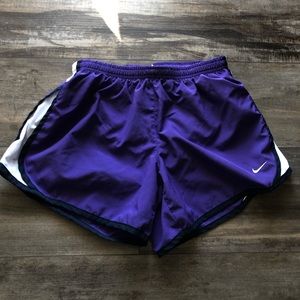 Nike DriFit Athletic shorts size XL Kids. Purple shorts with white and black